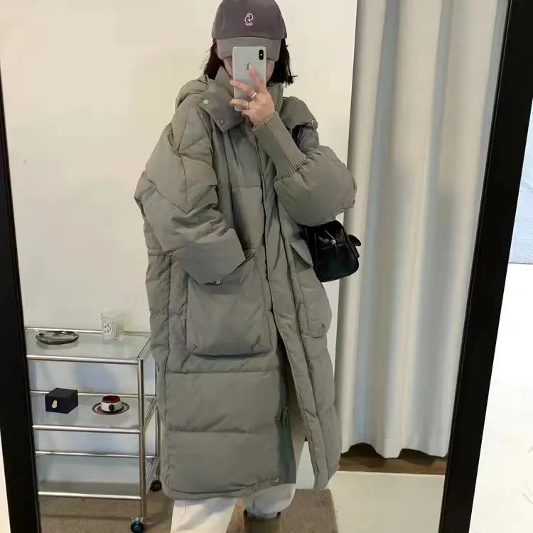 2024 new down jacket women's medium and long Korean version fashion hooded thickened loose anti-season small winter coat