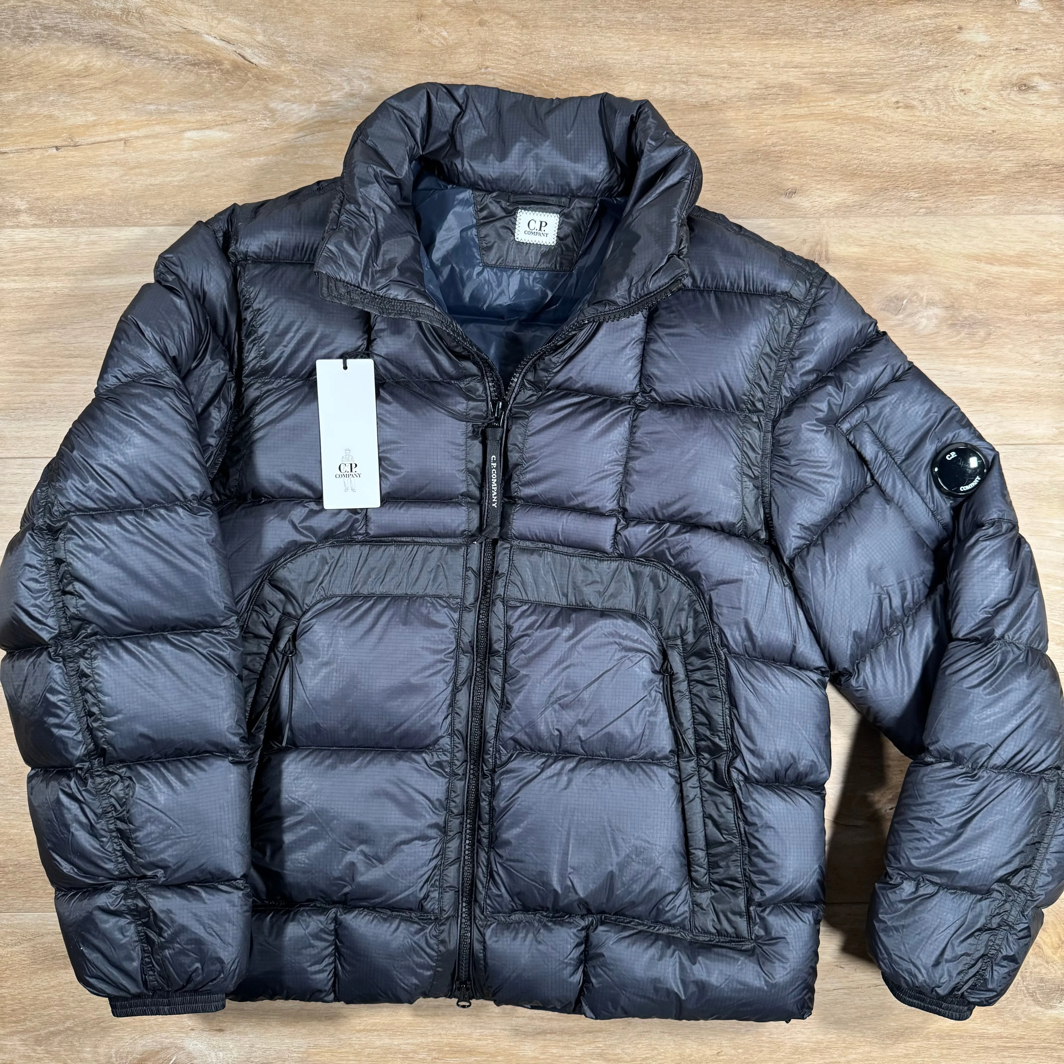 C.P. Company Short Down Lens Jacket in Navy