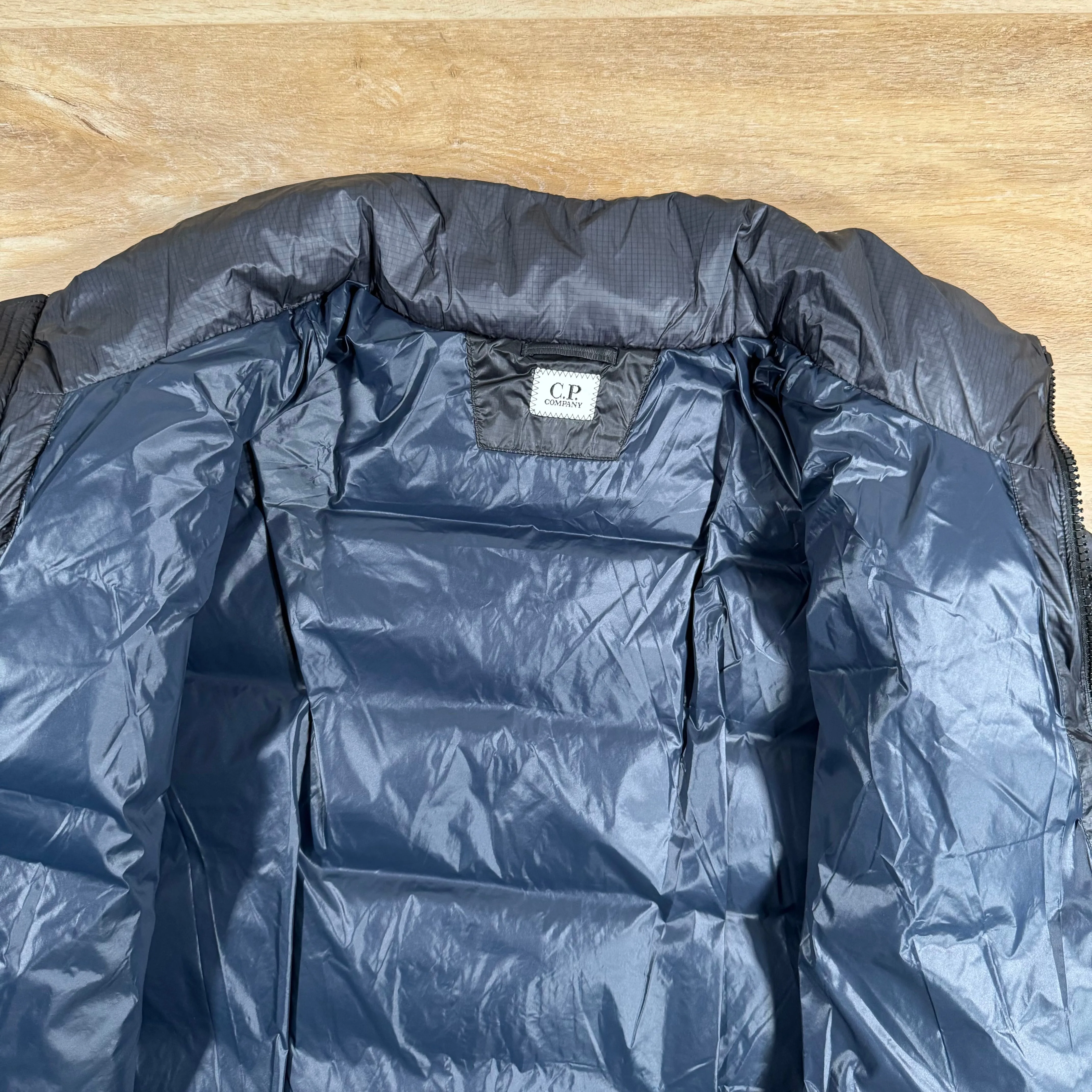 C.P. Company Short Down Lens Jacket in Navy