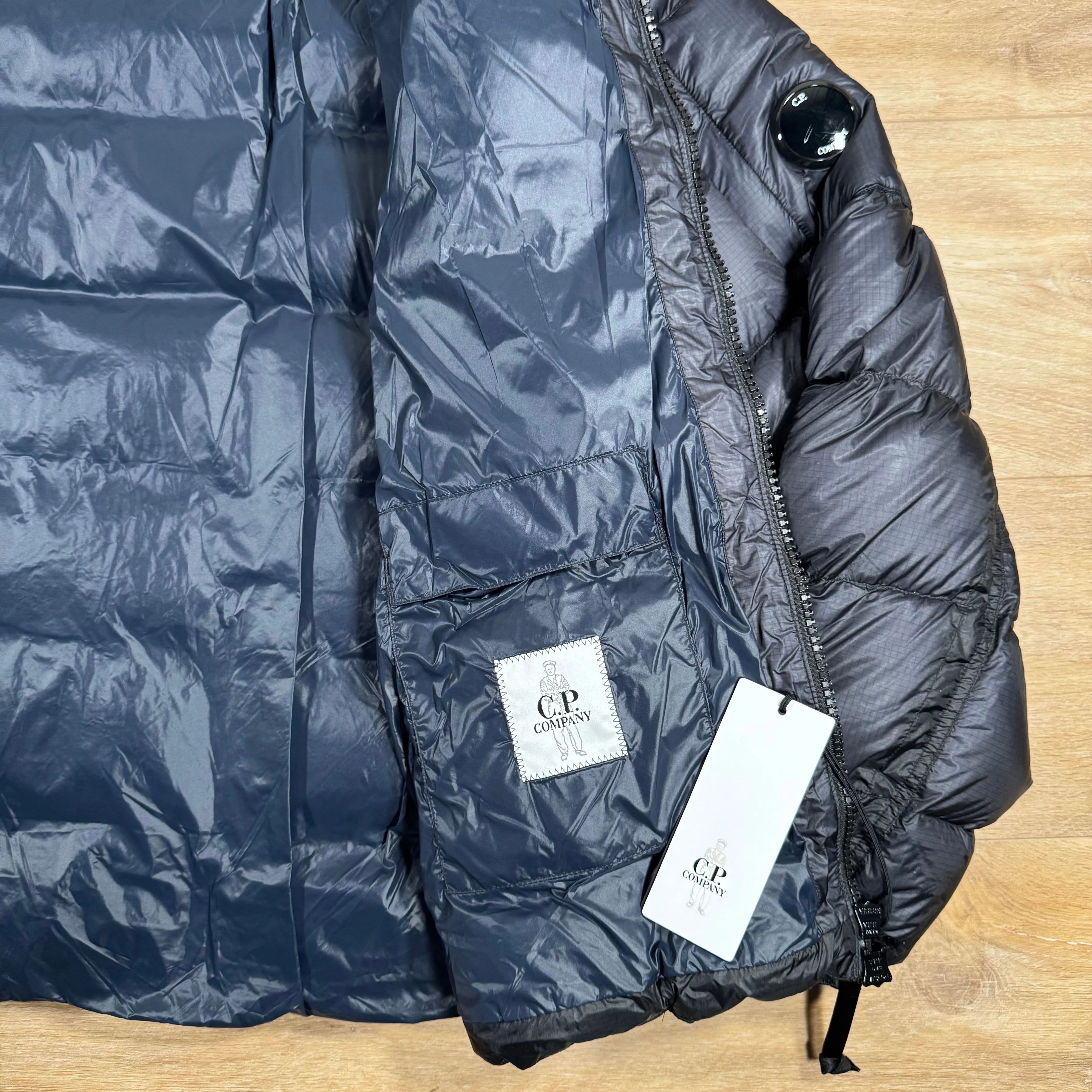 C.P. Company Short Down Lens Jacket in Navy