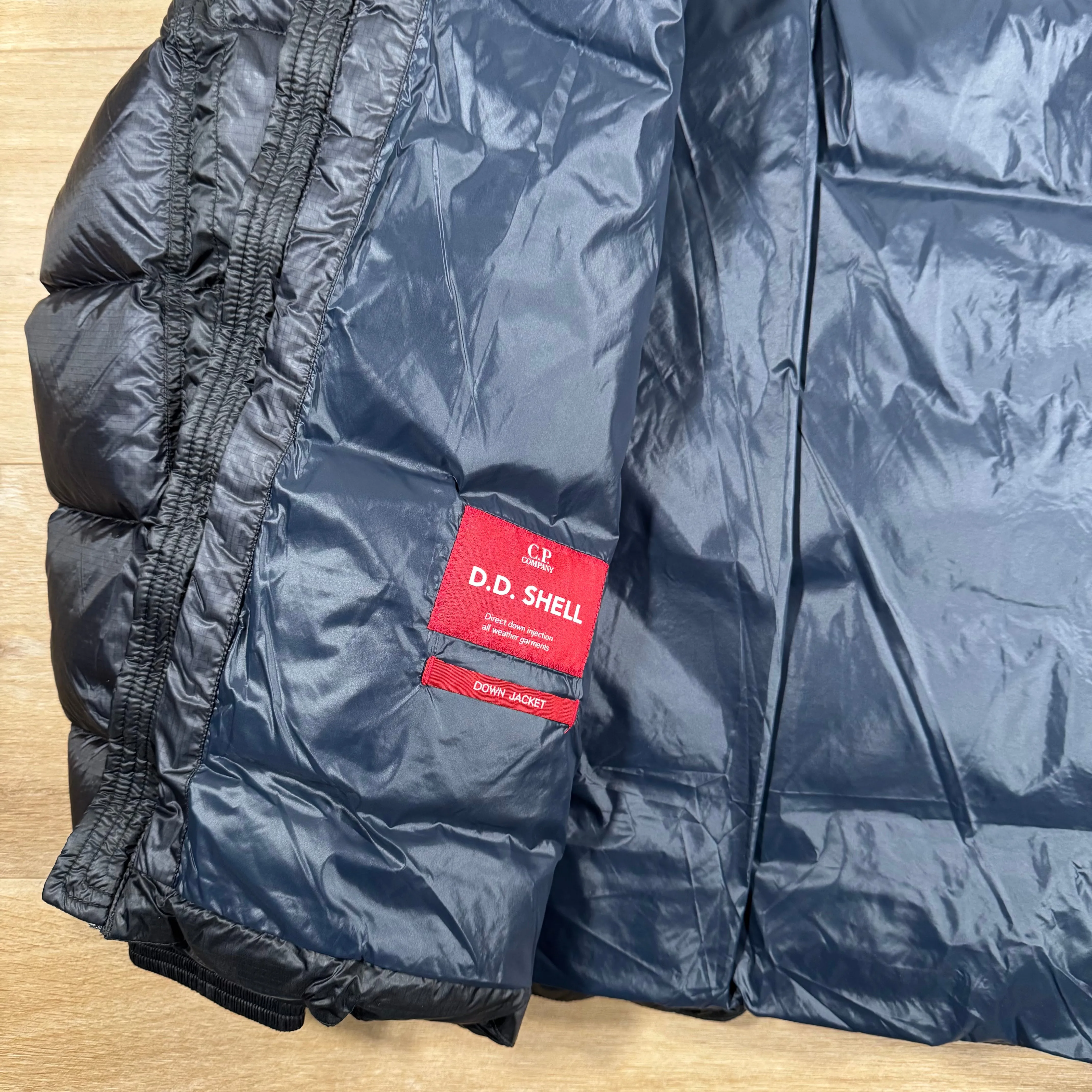 C.P. Company Short Down Lens Jacket in Navy